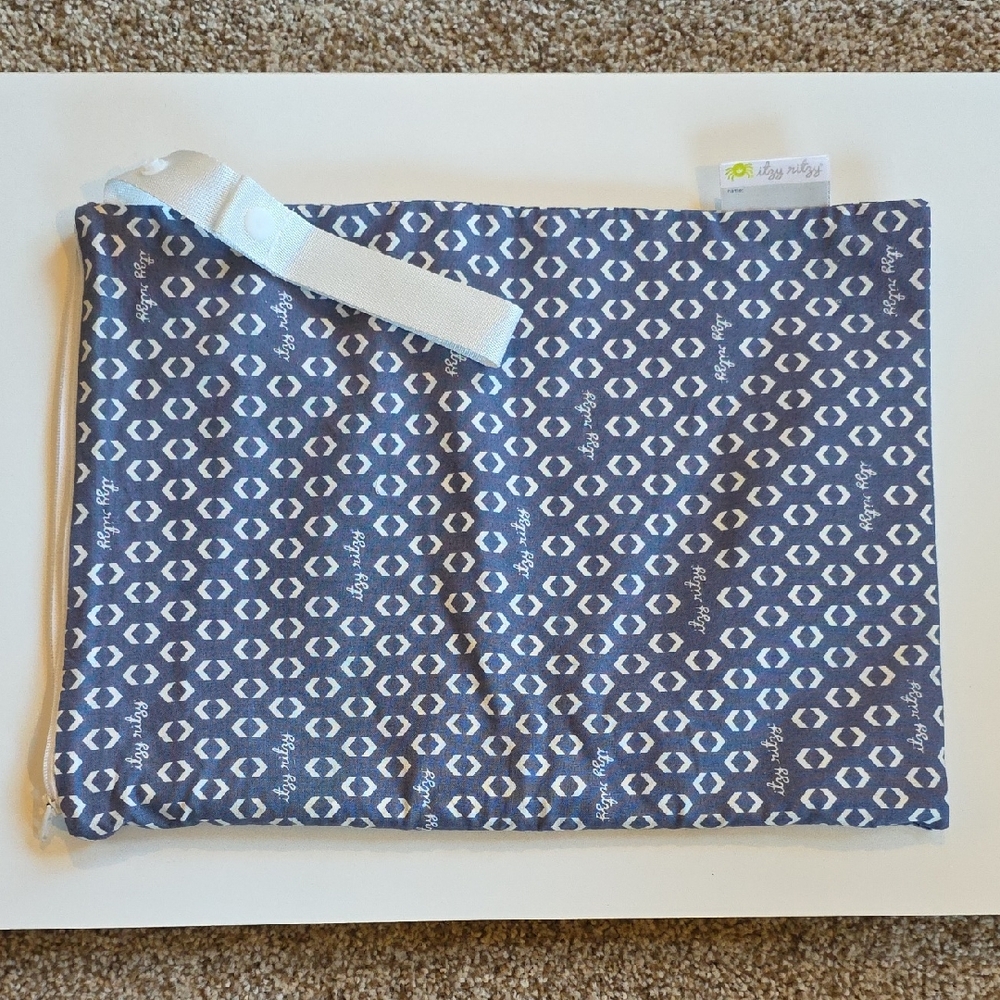 Itzy Ritzy Travel Happens Wet Bag -  Blue and White Patterned Zipper Bag